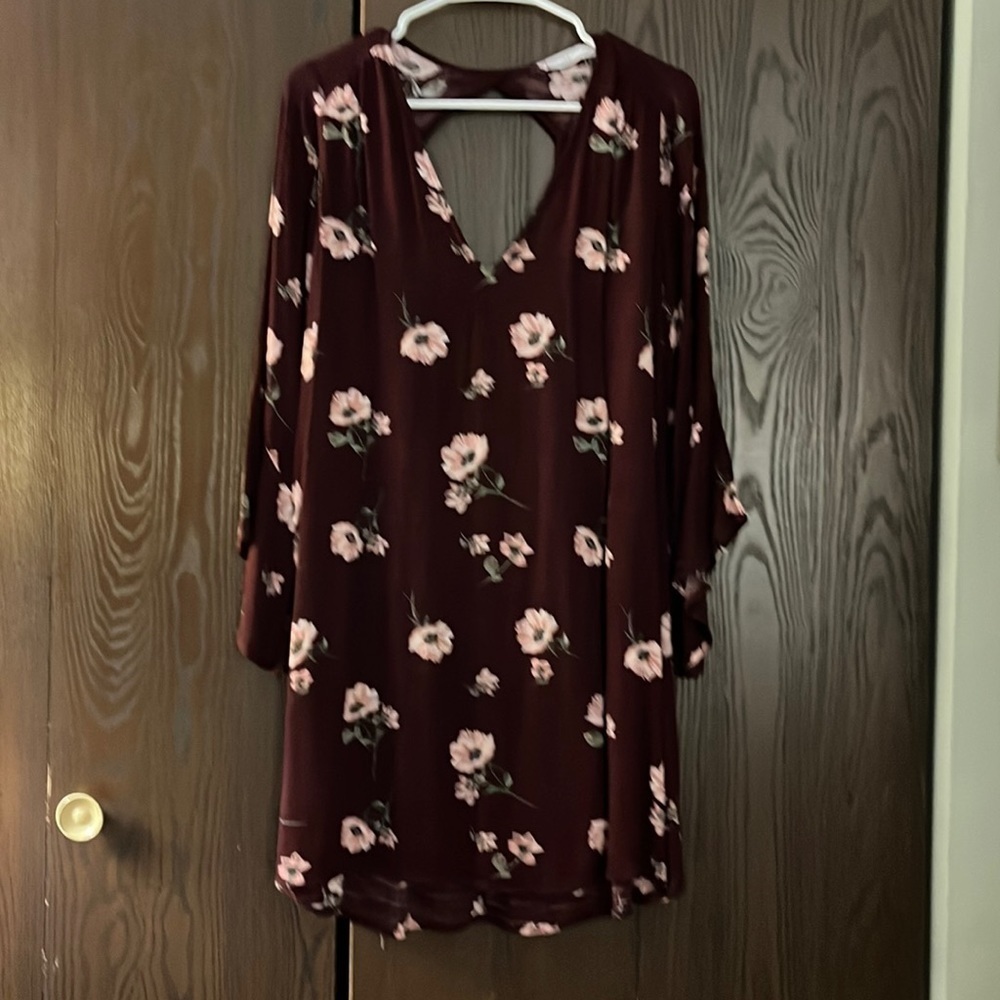 Lush eggplant colored dress with flowers. 3/4 flared sleeves. Size Medium